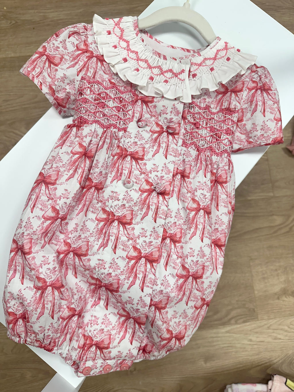 Pink Bow Toile Hand Smocked Romper